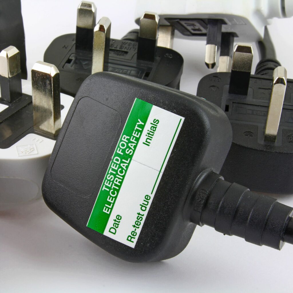 UK plug with PAT testing label on it