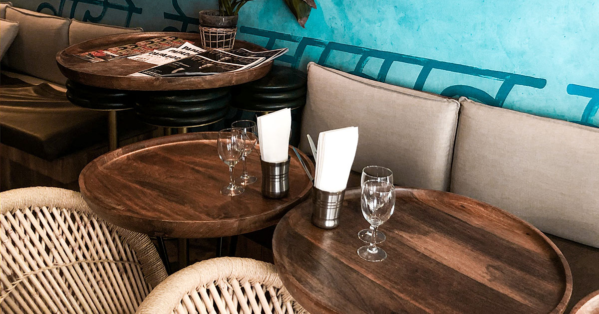 café with round table and light blue wall