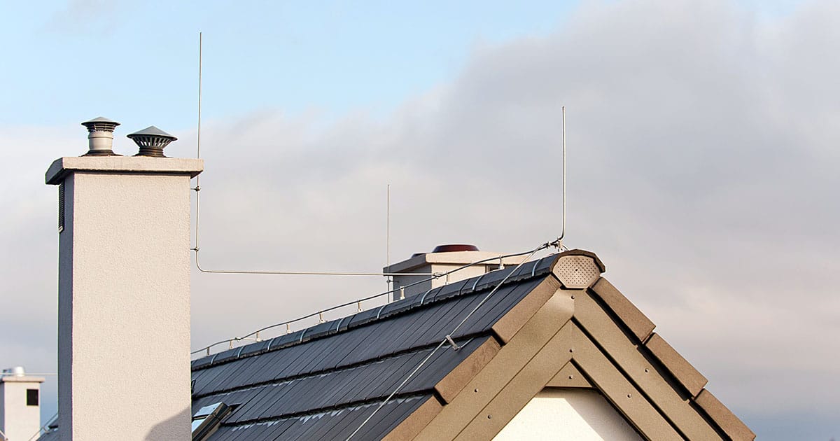 Twin lightning conductor rod on roof of house