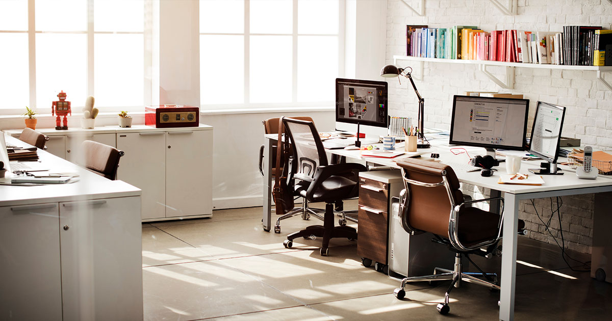 Modern office with brown chairs