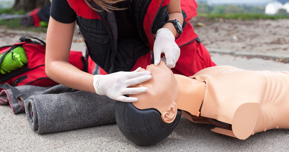 Lady giving CPR