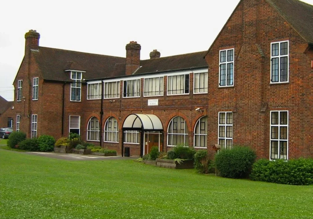 School Image of the main entrance of Falconer School, Bushey